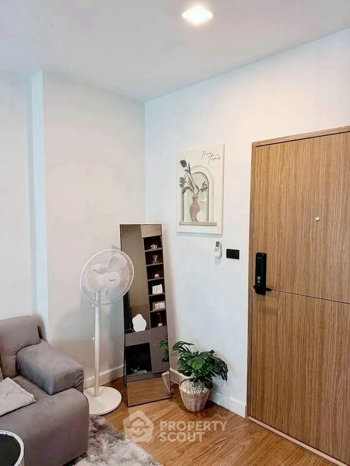 Modern living room with stylish decor and wooden flooring