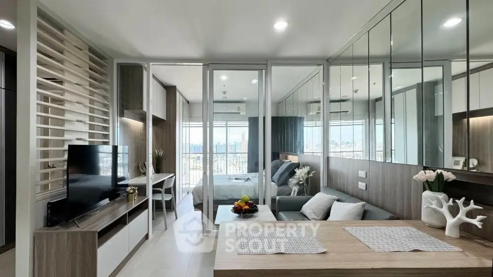 Modern open-plan living room with stylish decor and city view