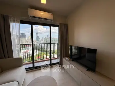 Modern living room with city view balcony and sleek furniture