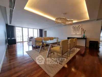 Spacious modern living room with elegant dining area and stylish lighting