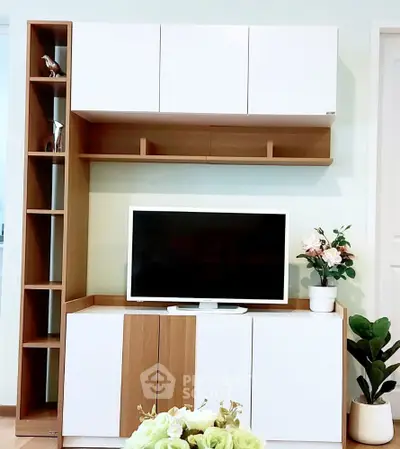 Modern living room with sleek TV unit and stylish decor
