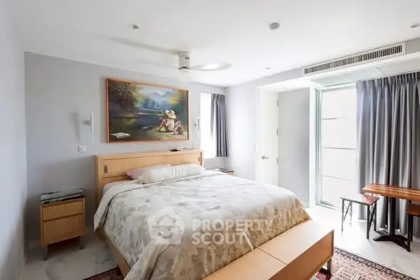 Modern bedroom with natural light and stylish decor