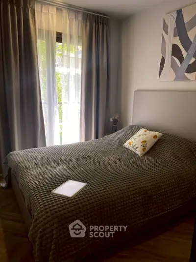 Cozy bedroom with modern decor and natural light