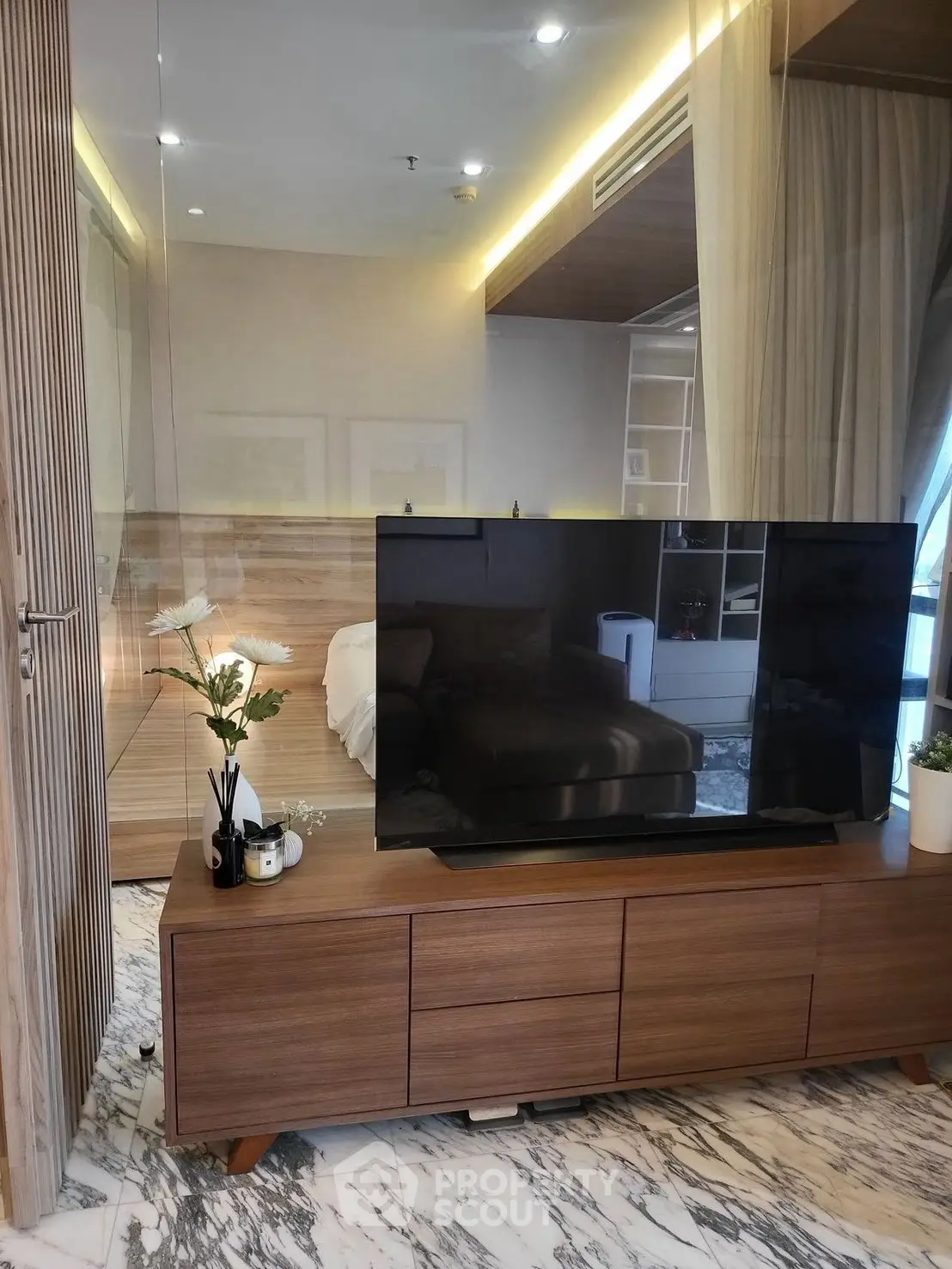 Modern living room with sleek TV stand and elegant decor