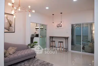 Modern living room with stylish lighting and cozy seating area