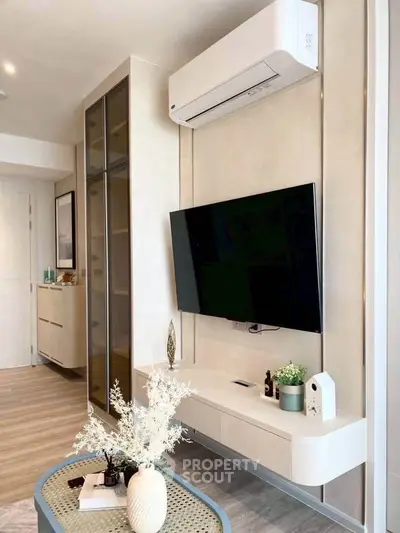 Modern living room with sleek TV setup and stylish decor