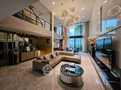 Luxurious modern living room with high ceilings, elegant chandeliers, and spacious seating area.