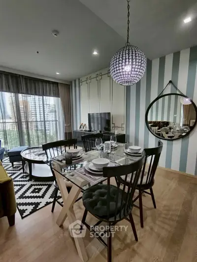 Stylish modern living room with dining area, featuring chic decor and large windows with city view.