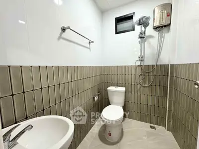 Modern bathroom with sleek fixtures and stylish tile design