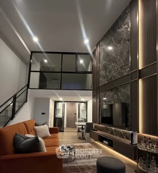 Luxurious modern living room with high ceilings and elegant decor