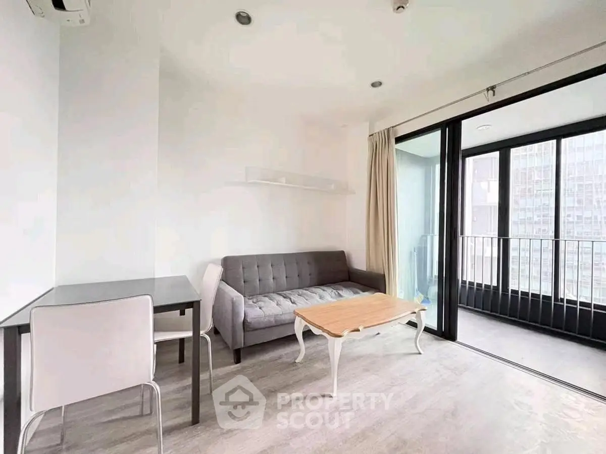 Modern living room with balcony in a high-rise apartment