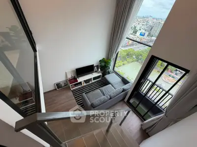 Modern loft apartment with stunning city view and spacious living area.