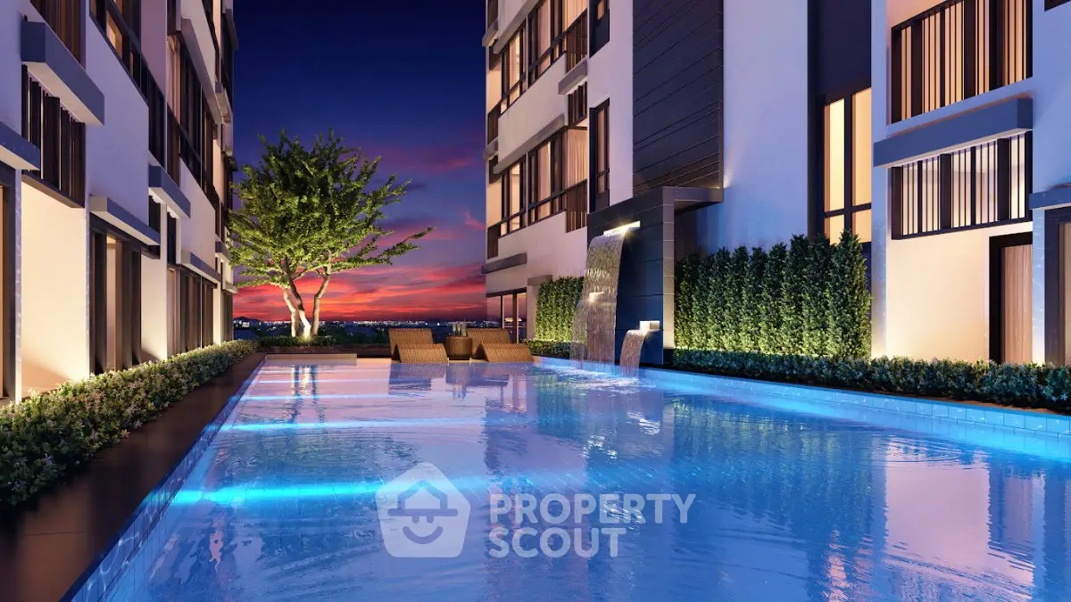 Luxurious apartment pool with stunning sunset view and modern design.