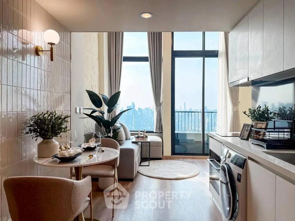 Modern living room with city view, stylish decor, and open kitchen layout.