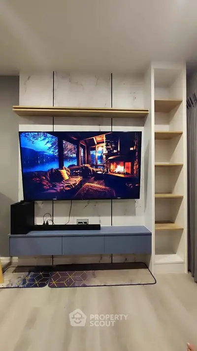 Modern living room with stylish TV setup and elegant shelving