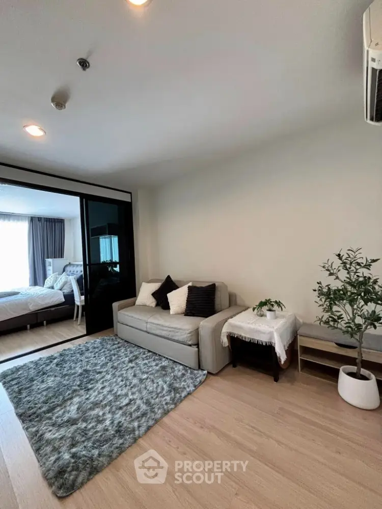 Modern living room with cozy sofa and stylish decor in a bright apartment
