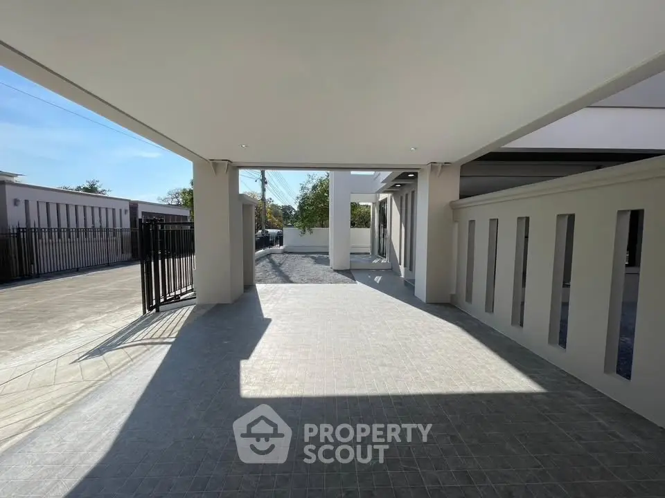 Spacious modern entrance with sleek design and ample natural light