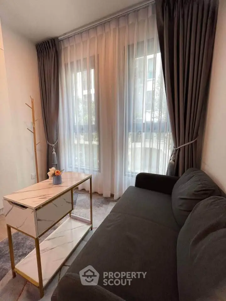 Cozy living room with elegant curtains and modern furniture