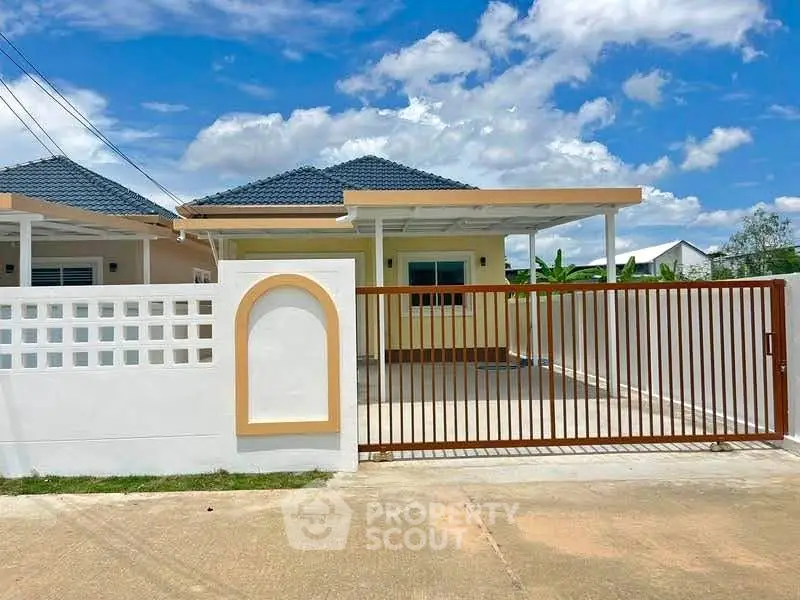 Charming single-story home with modern design and spacious driveway, perfect for family living.
