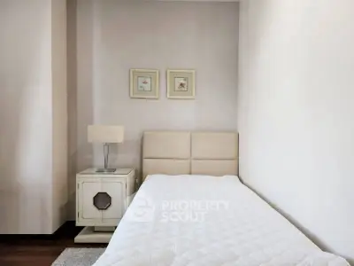 Cozy bedroom with modern decor and elegant furnishings for a serene living experience.