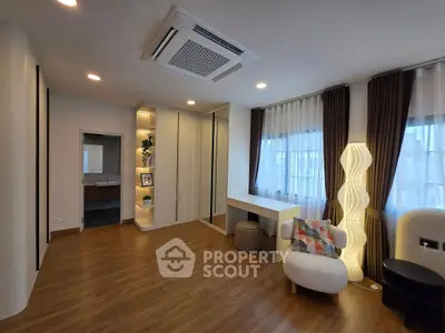 Modern living room with stylish furniture and elegant lighting