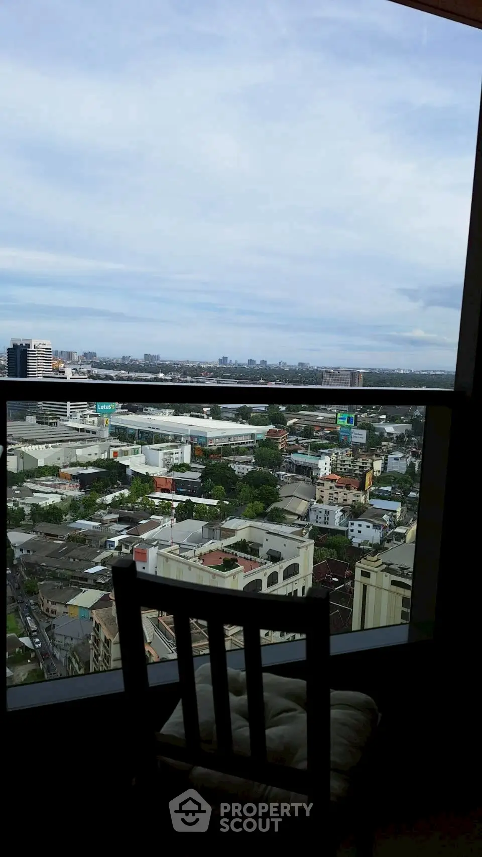 Stunning cityscape view from a high-rise balcony, perfect for urban living enthusiasts.