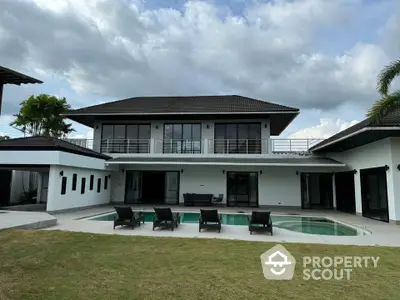 Luxurious modern villa with private pool and spacious outdoor area, perfect for relaxation and entertainment.