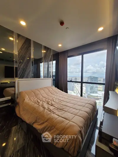 Luxurious bedroom with stunning city view and modern decor