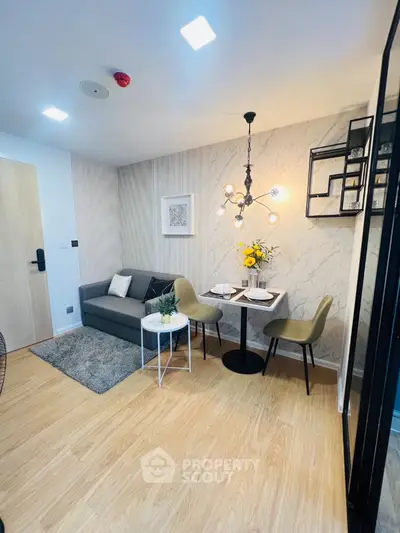 Modern living room with stylish decor and cozy dining area