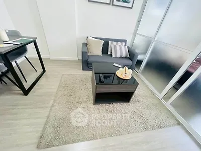 Modern living room with cozy sofa and stylish decor