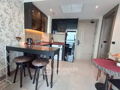 Modern kitchen with stylish bar stools and elegant decor