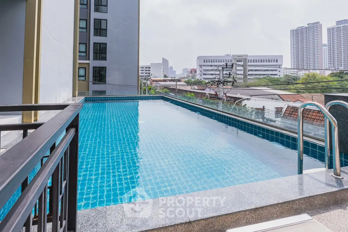 Stunning rooftop pool with city views in modern apartment complex