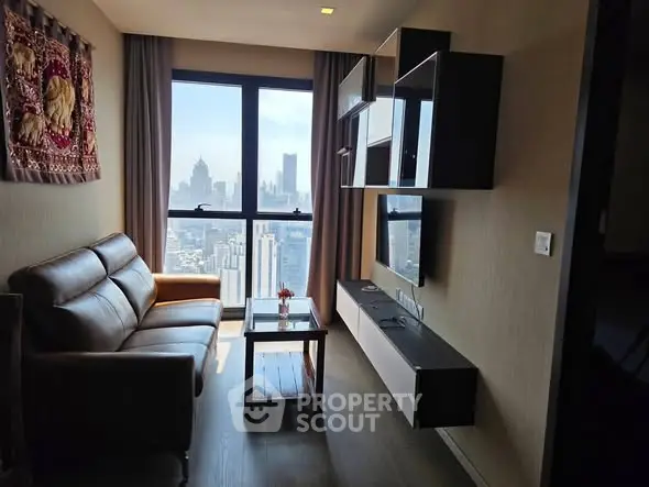 Modern living room with stunning city view and stylish furniture in high-rise apartment.