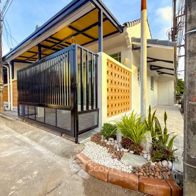 Charming modern house with stylish facade and landscaped garden