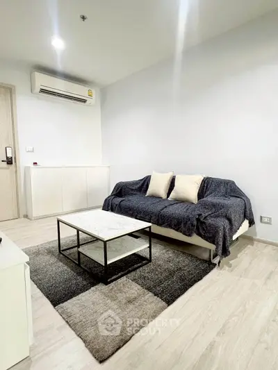 Modern living room with cozy sofa and sleek design