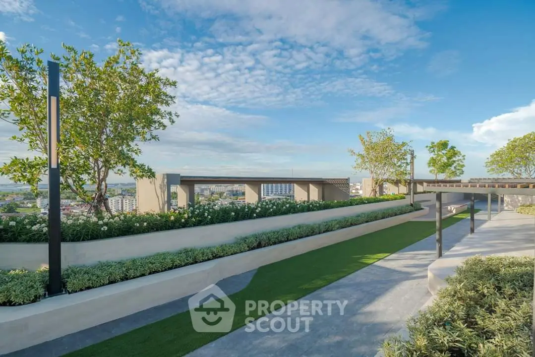 Stunning rooftop garden with panoramic city views and lush greenery, perfect for relaxation and gatherings.