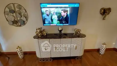 Elegant living room with stylish TV console and decorative accents