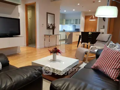 Modern living room with open kitchen and stylish decor