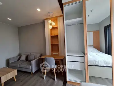 Modern apartment interior with cozy living area and stylish bedroom
