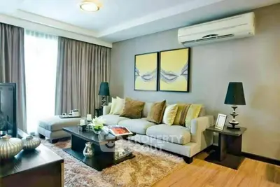 Stylish living room with modern decor, cozy seating, and elegant lighting.