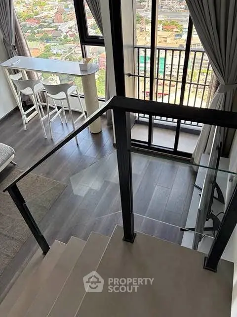 Modern duplex apartment with stunning city view and stylish interior design.