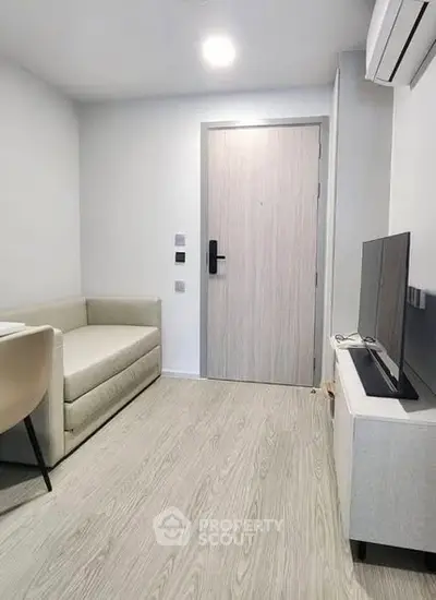 Modern living room with sleek furniture and minimalist design