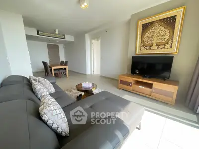 Spacious modern living room with elegant decor and ample natural light