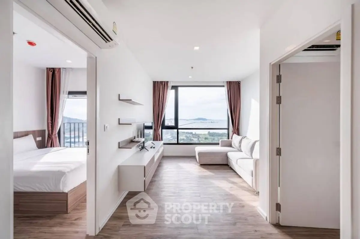 Modern living room with stunning sea view and elegant decor