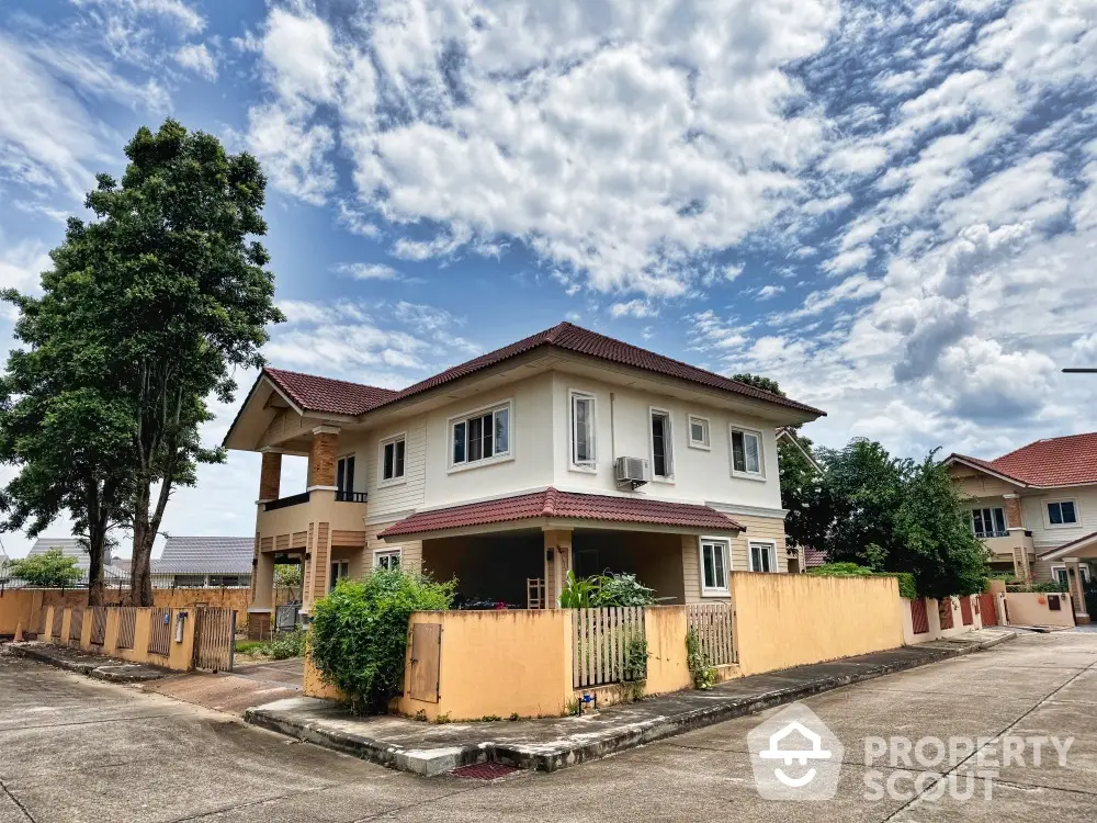 Charming two-story house with spacious yard and beautiful sky view