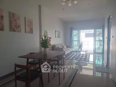 Spacious living room with elegant decor and natural light