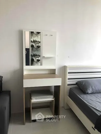 Modern bedroom with sleek furniture and stylish decor