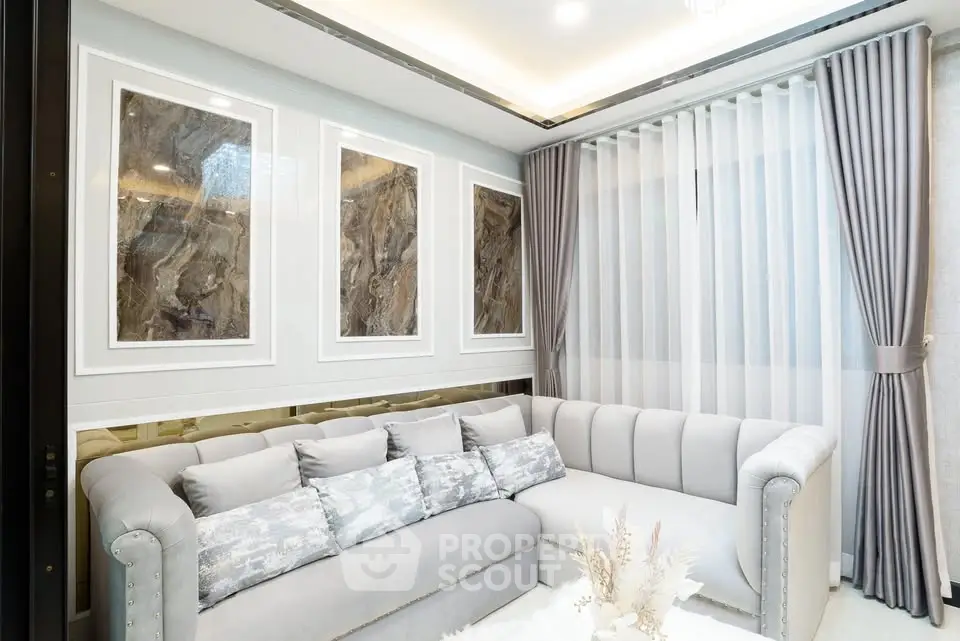 Luxurious modern living room with elegant decor and plush seating