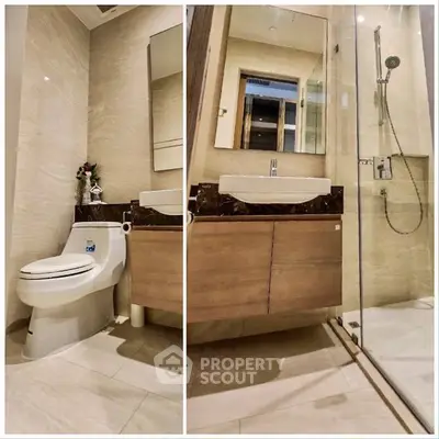 Modern bathroom with sleek fixtures and glass shower enclosure, featuring elegant tile work and contemporary design.