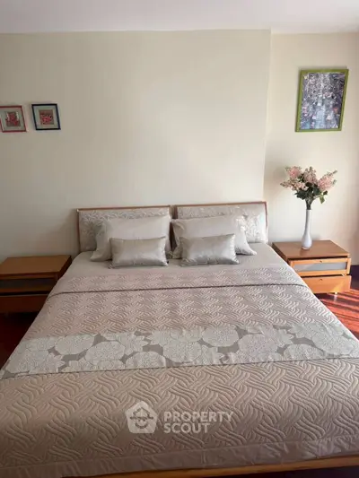 Cozy bedroom with elegant decor and floral accents